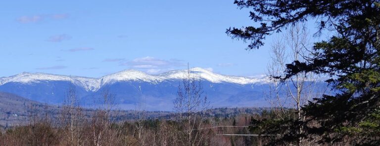 Photograph of mountains in northern New Hampshire, including mount Washington and nearby peaks.