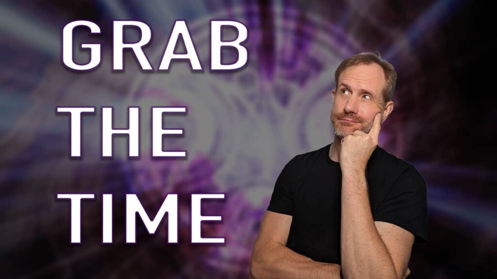 Mickey in black T-shirt with thoughtful finger against face looking at text overlay: "Grab the Time"